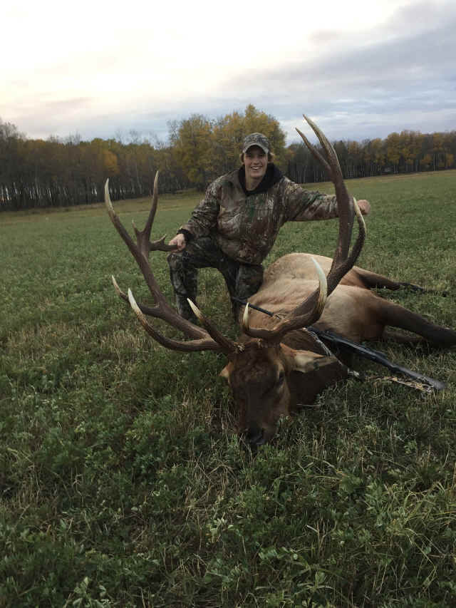 Brennan Challinor from Canada with trophy bull elk at Echo Lake Hunts in Saskatchewan