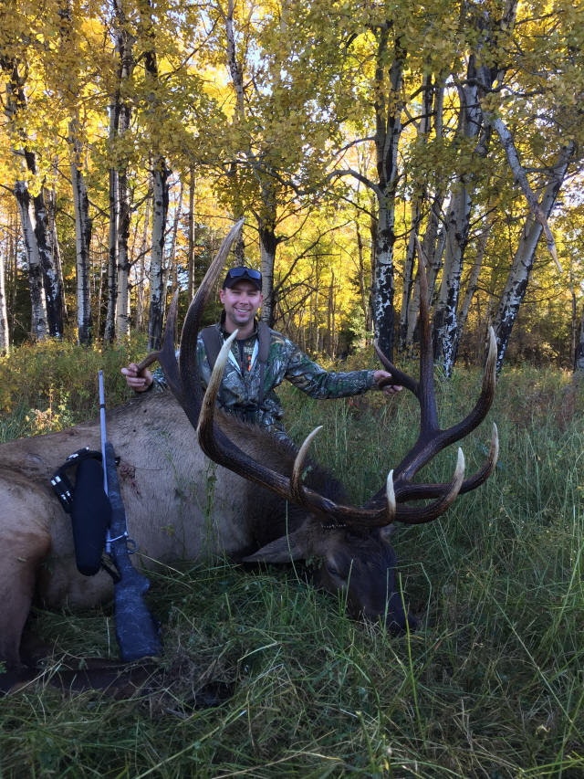 Casey Hystad from North Dakota with trophy bull elk at Echo Lake Hunts in Saskatchewan