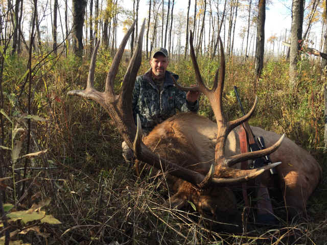 Chris Challinor from Canada with trophy bull elk at Echo Lake Hunts in Saskatchewan