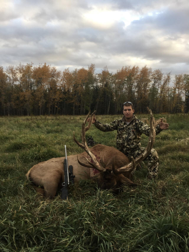 Darren Burau from North Dakota with trophy bull elk at Echo Lake Hunts in Saskatchewan