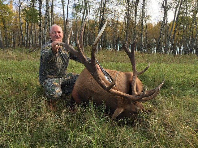 Dieter Konrath from Canada with trophy bull elk at Echo Lake Hunts in Saskatchewan
