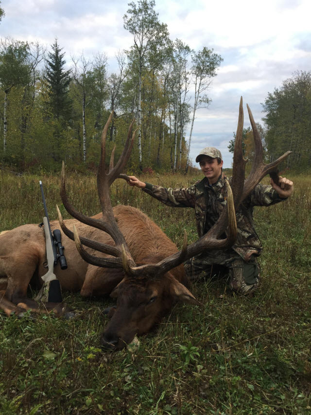 Jaxson Lister from Oklahoma with trophy bull elk at Echo Lake Hunts in Saskatchewan