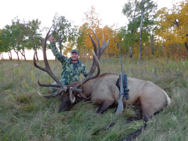 Shaun Hystad from Montana with trophy bull elk at Echo Lake Hunts in Saskatchewan