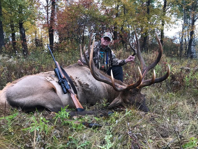 Bill Murphy from North Dakota with trophy bull elk at Echo Lake Hunts in Saskatchewan