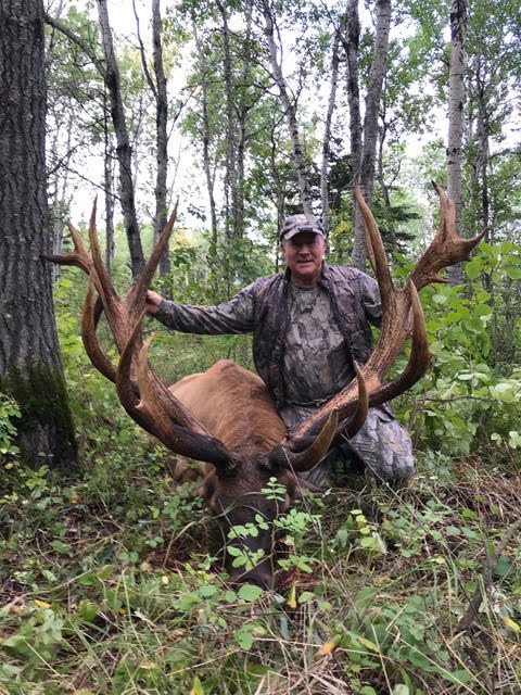 Arnie Burke from Arkansas with trophy bull elk at Echo Lake Hunts in Saskatchewan