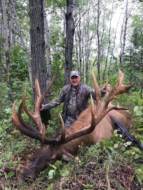 Arnie Burke from Arkansas with trophy bull elk at Echo Lake Hunts in Saskatchewan