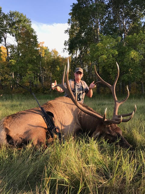 Mike Mayes Sr from Nebraska with trophy bull elk at Echo Lake Hunts in Saskatchewan