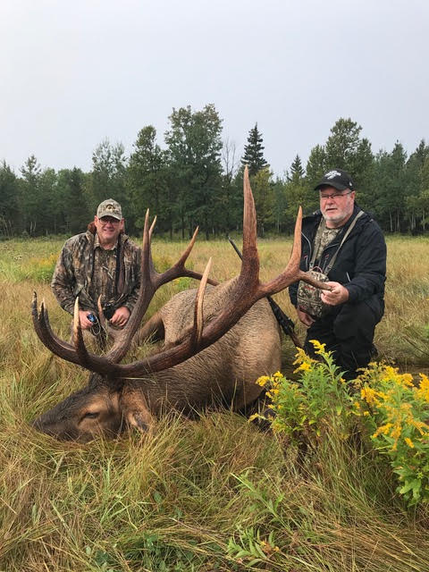 Two happy chaps after hunting elk in Saskatchewan Canada