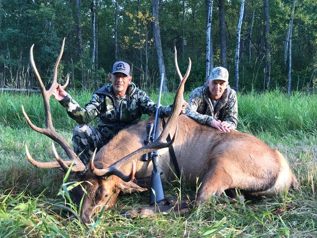 Brett and host Randy after hunting elk in Saskatchewan Canada