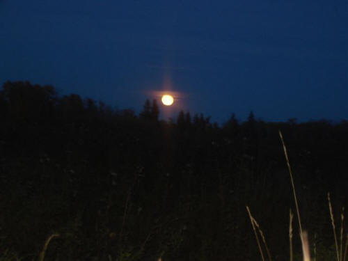 The moon over Echo Lake after hunting elk in Saskatchewan Canada