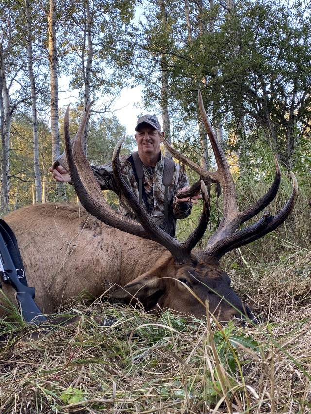 Dawayne Miller from Texas with trophy bull elk at Echo Lake Hunts in Saskatchewan