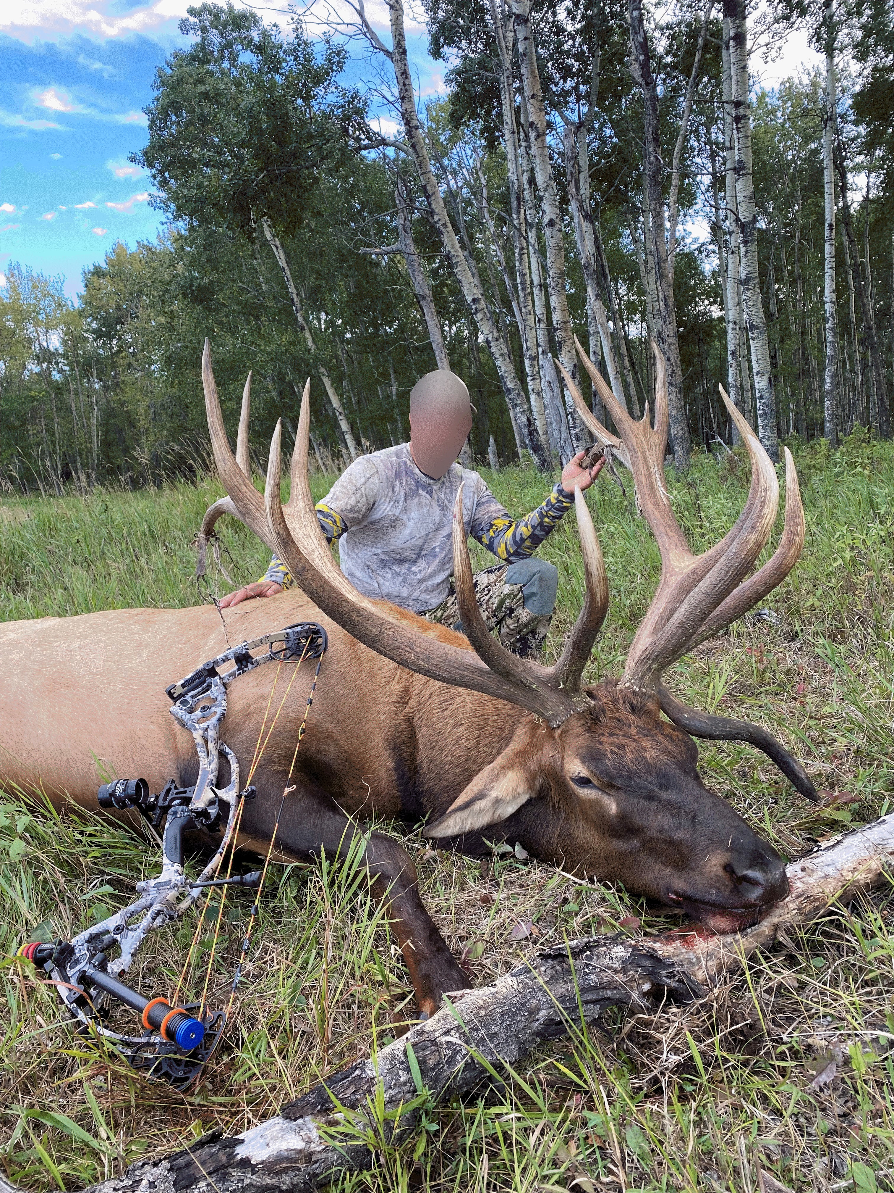 Hunter from North Dakota with trophy bull elk at Echo Lake Hunts in Saskatchewan
