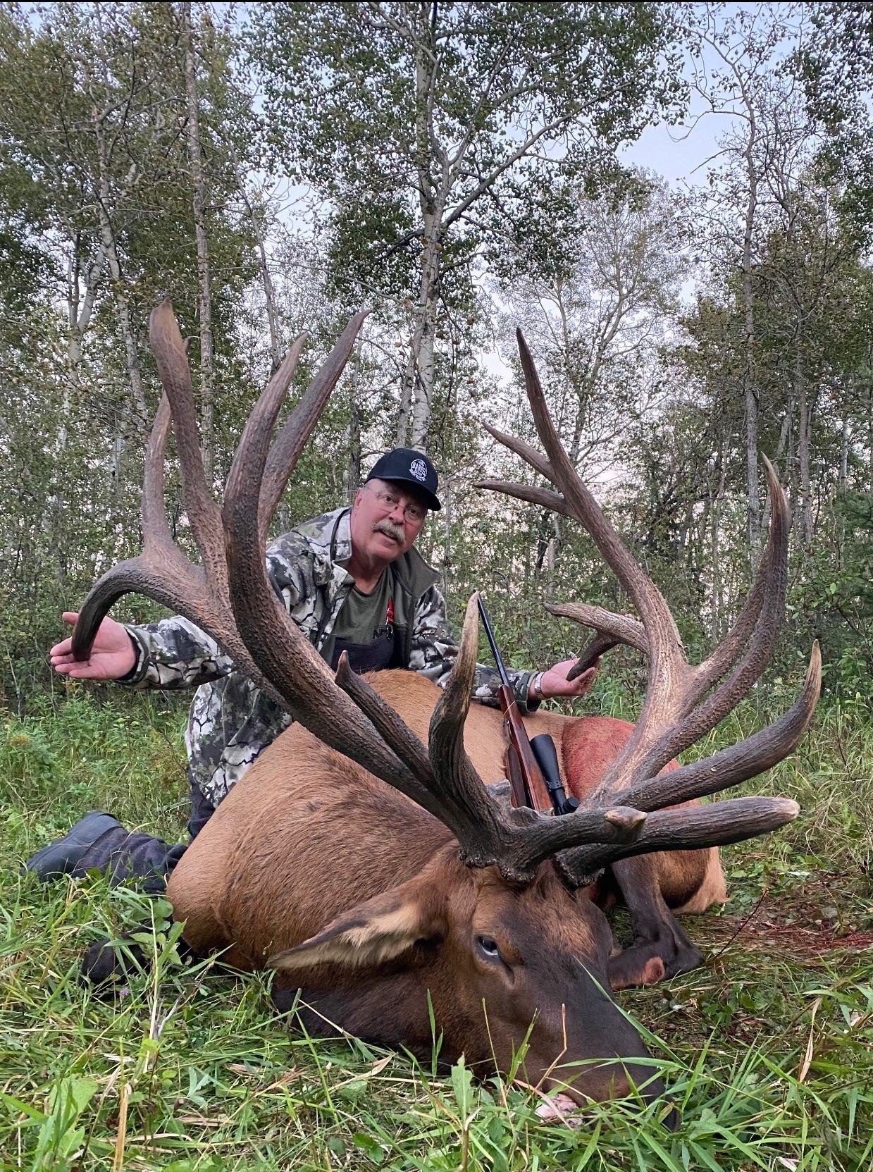 Chuck Dietz from Montana with trophy bull elk at Echo Lake Hunts in Saskatchewan