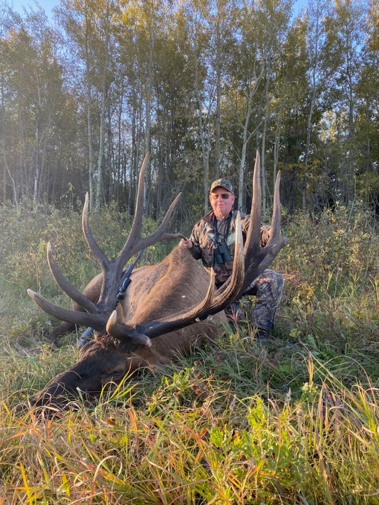 Dan Mason from California with trophy bull elk at Echo Lake Hunts in Saskatchewan