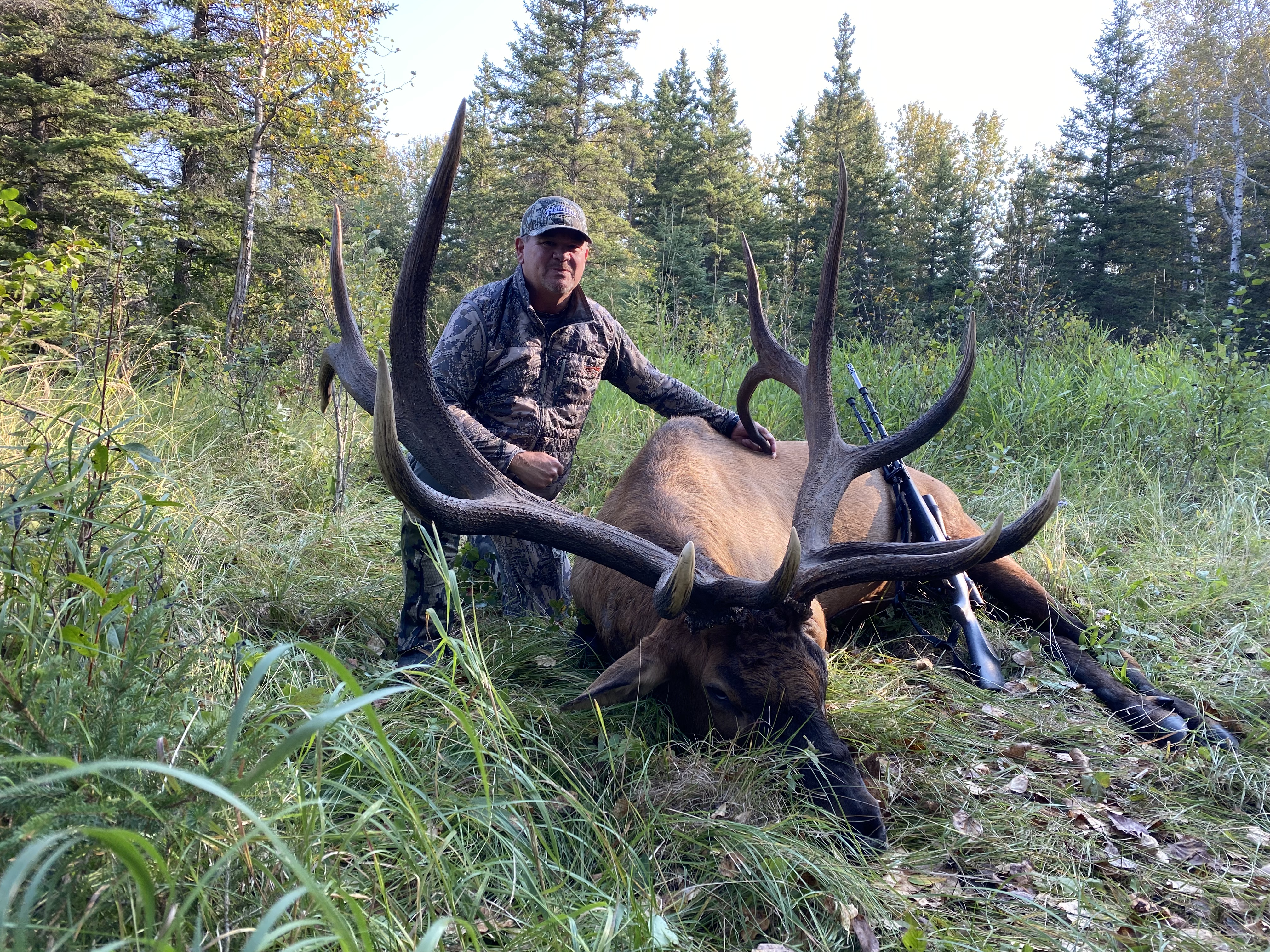 John Enott from Montana with trophy bull elk at Echo Lake Hunts in Saskatchewan