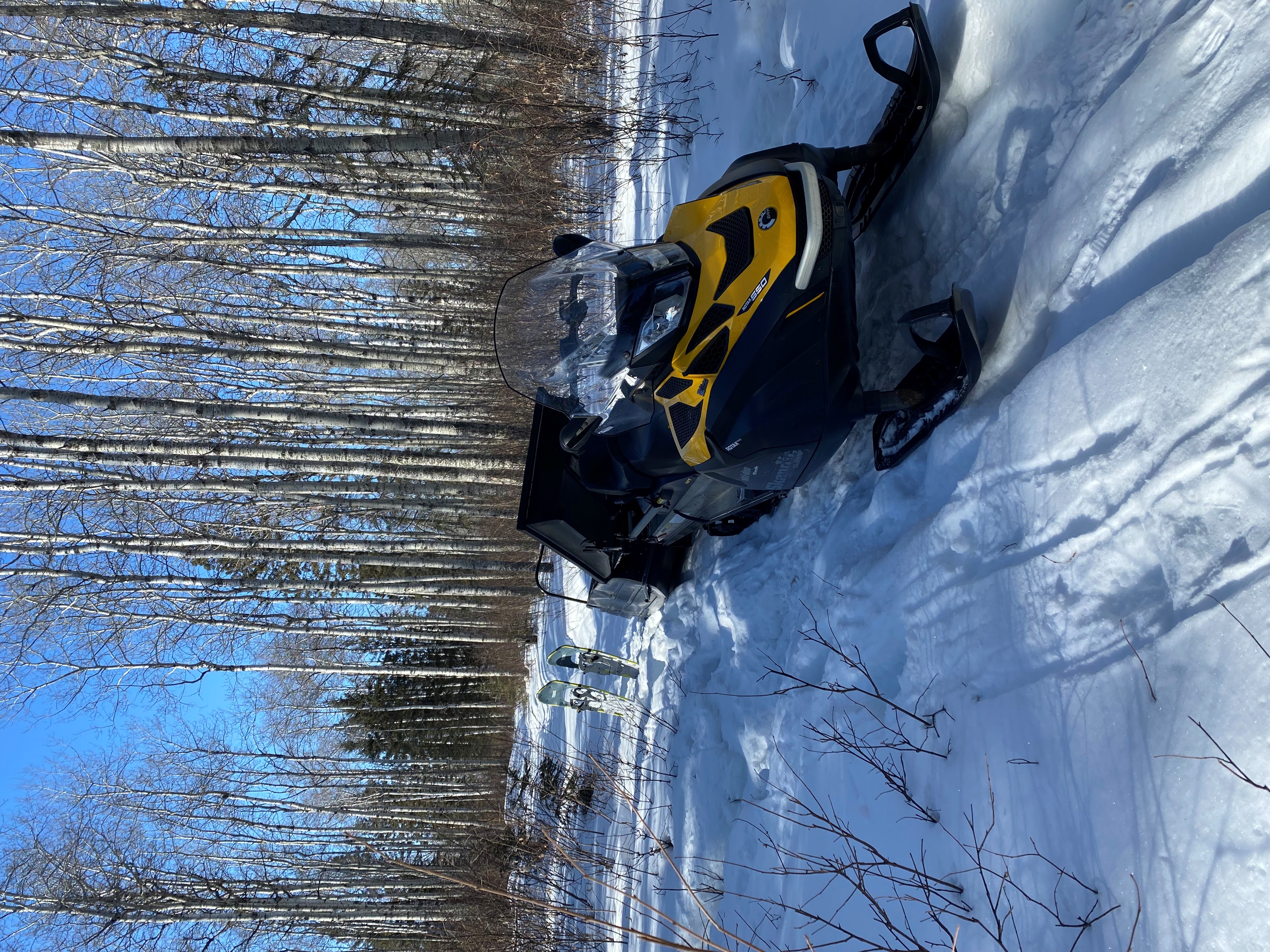 Snowmobiles and snowshoes after hunting elk in Saskatchewan Canada
