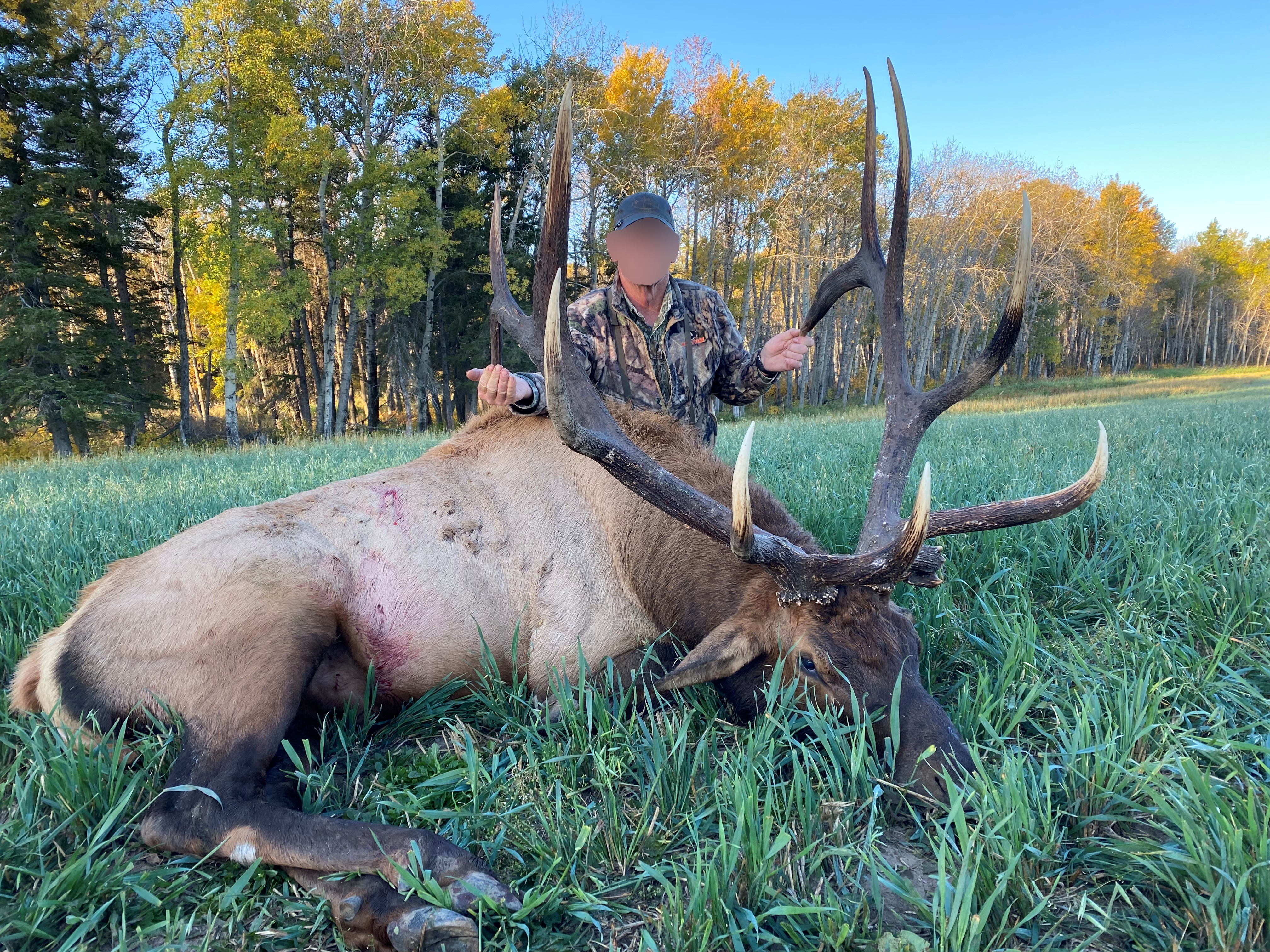 Hunter from USA with trophy bull elk at Echo Lake Hunts in Saskatchewan