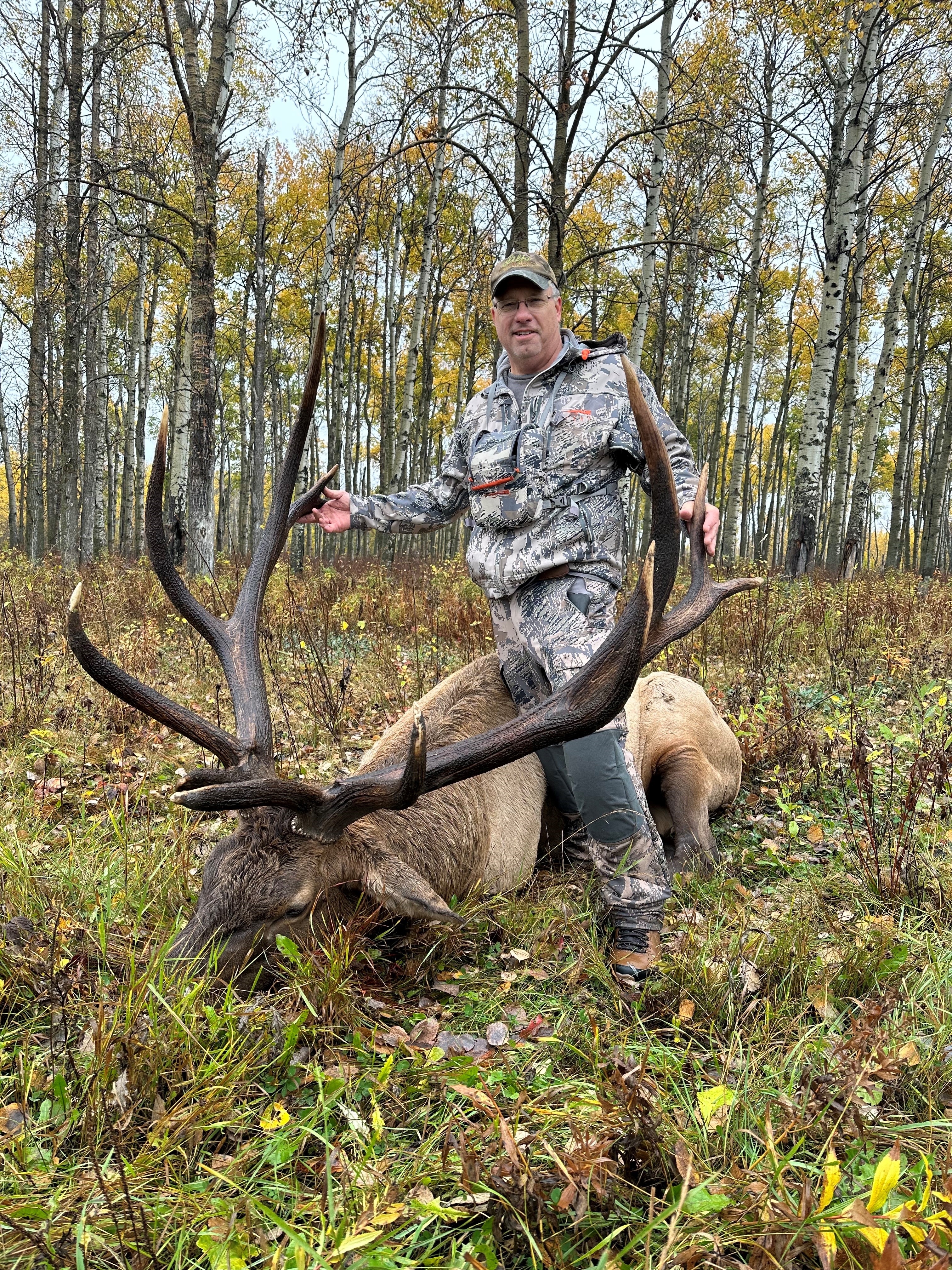 Bryce Orwick from Minnesota with trophy bull elk at Echo Lake Hunts in Saskatchewan