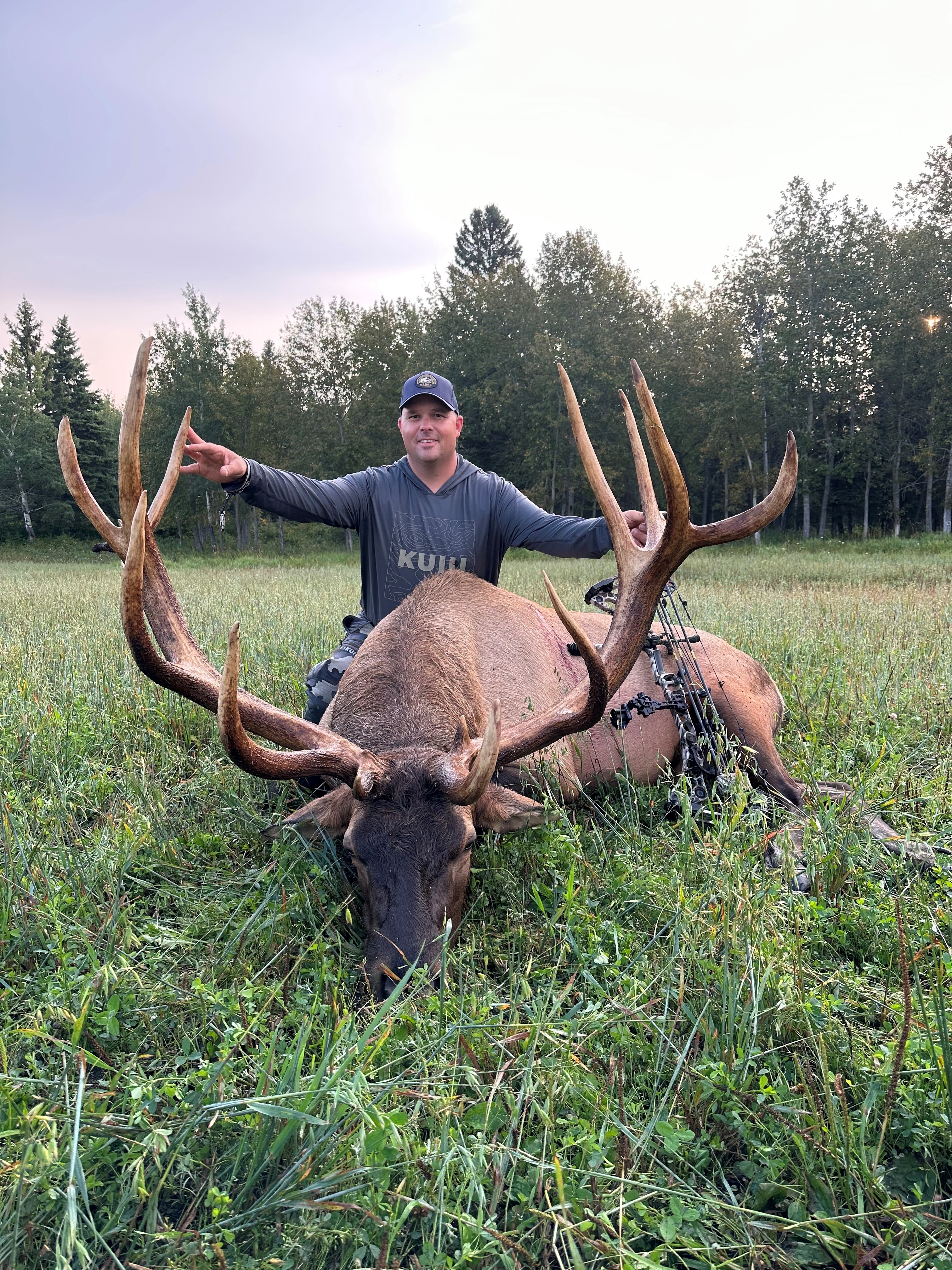 Issac Smith from North Dakota with trophy bull elk at Echo Lake Hunts in Saskatchewan