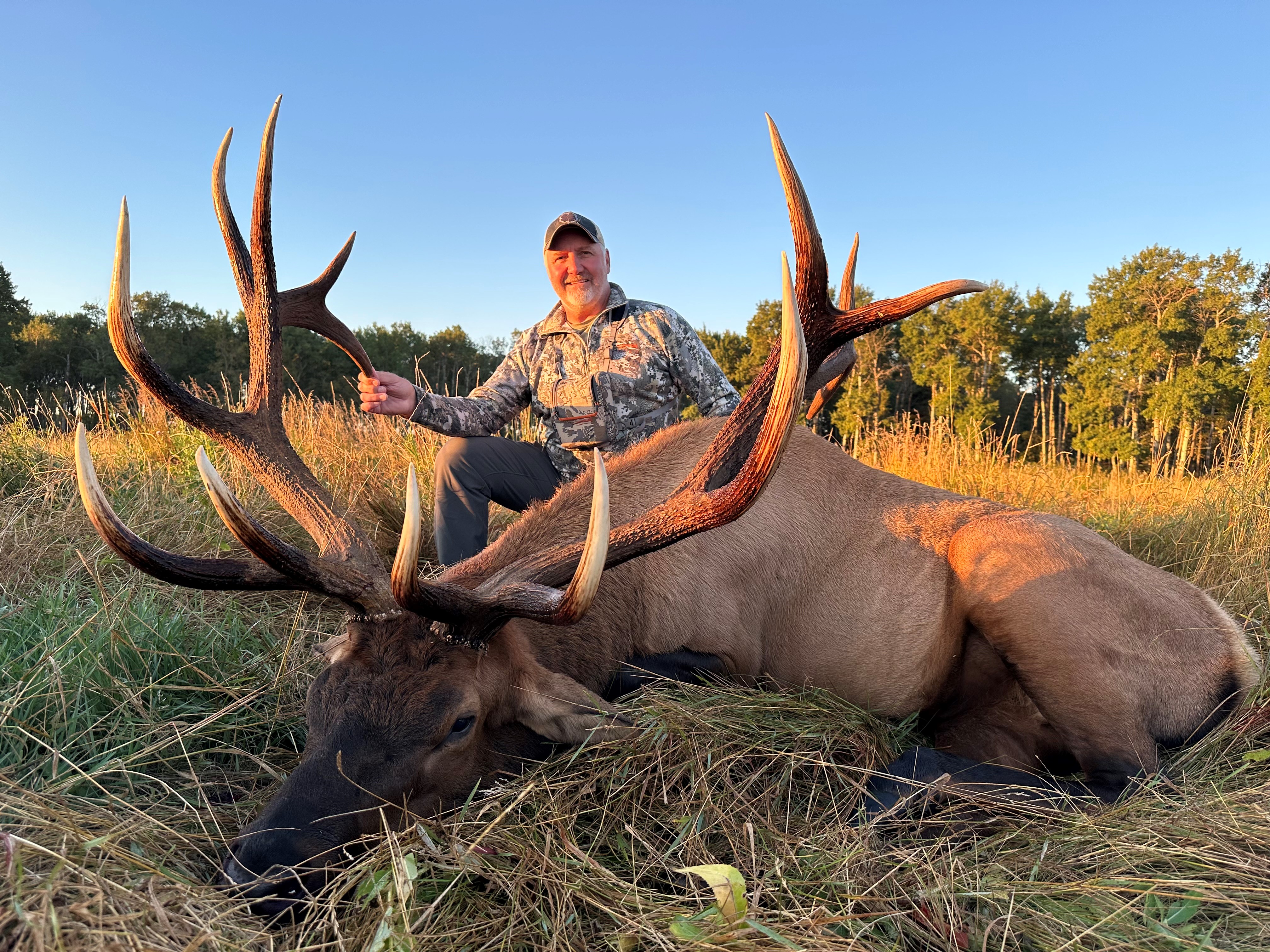 Chad Mares from Montana with trophy bull elk at Echo Lake Hunts in Saskatchewan