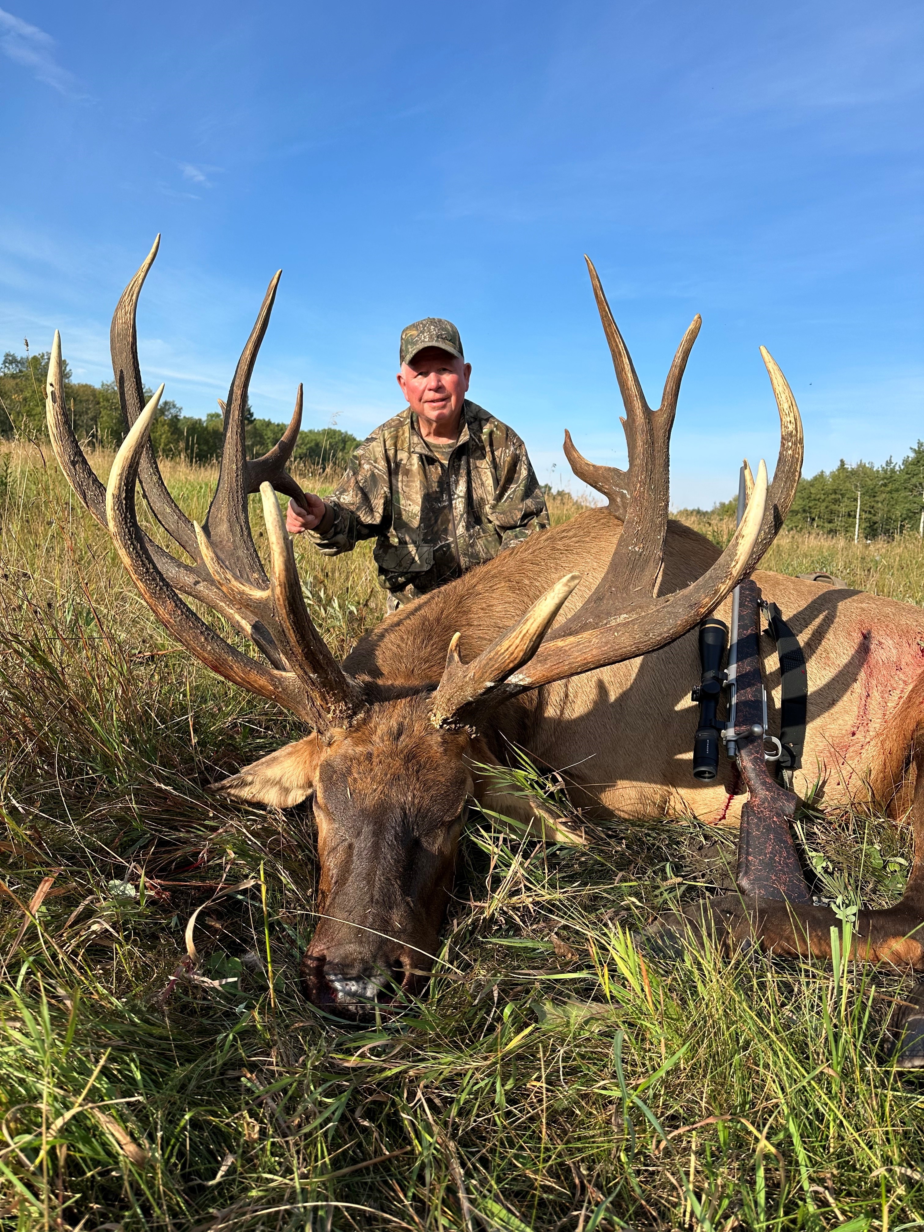 Doug Fraser from Montana with trophy bull elk at Echo Lake Hunts in Saskatchewan
