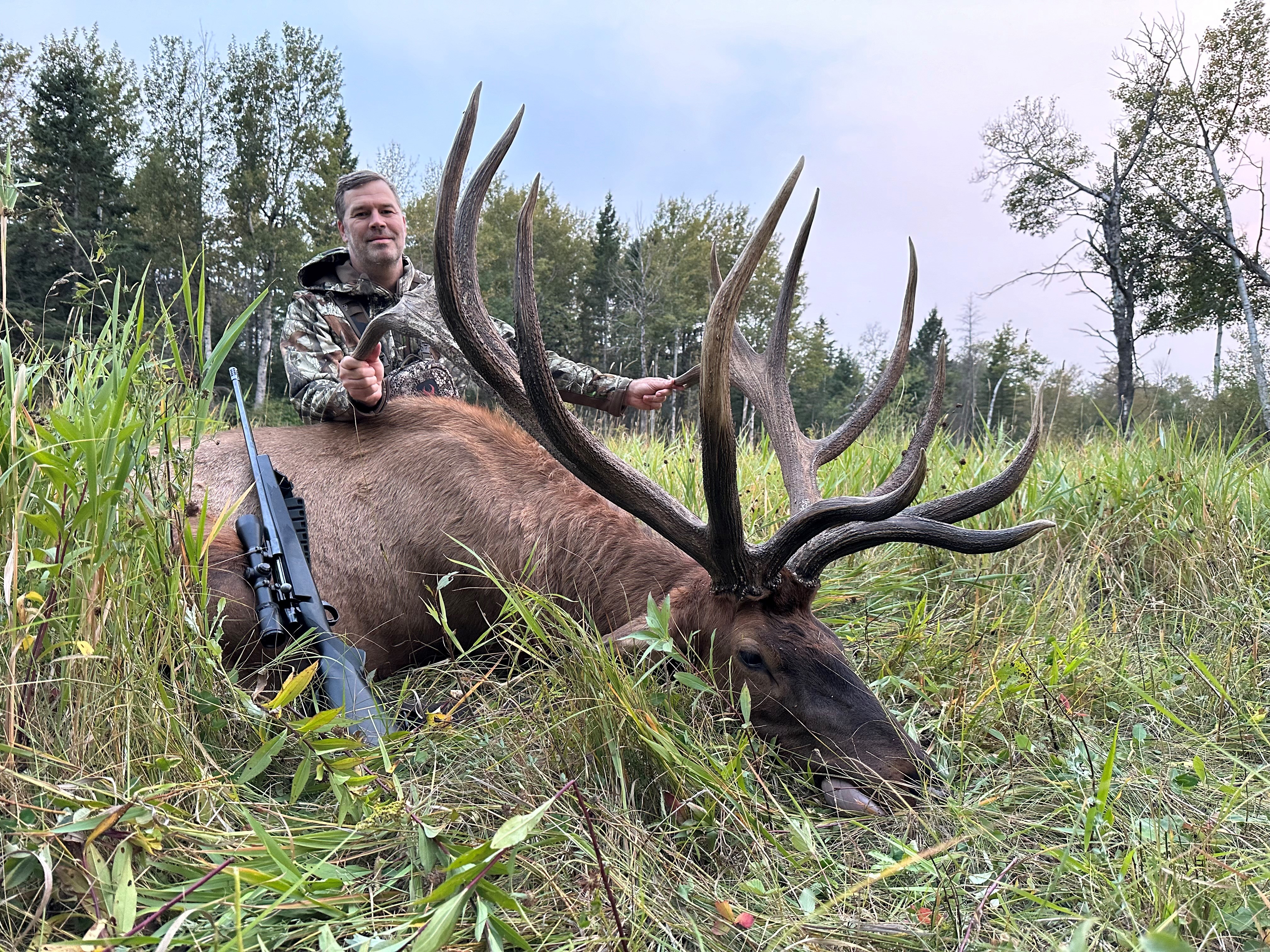 Matt Belger from Florida with trophy bull elk at Echo Lake Hunts in Saskatchewan