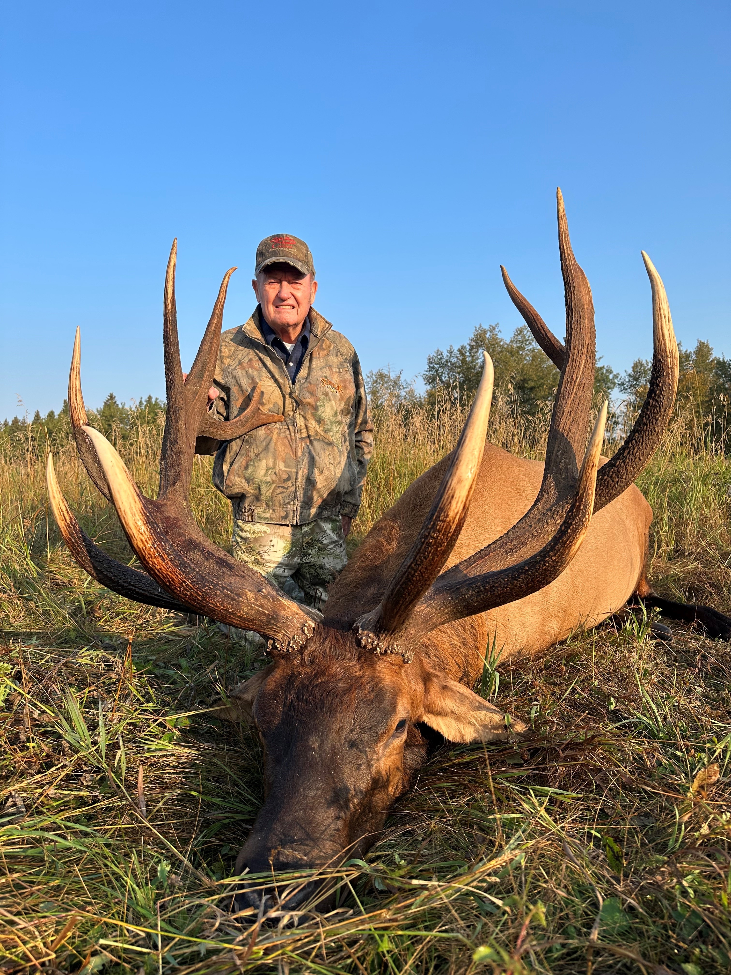 Tom Enott from Montana with trophy bull elk at Echo Lake Hunts in Saskatchewan