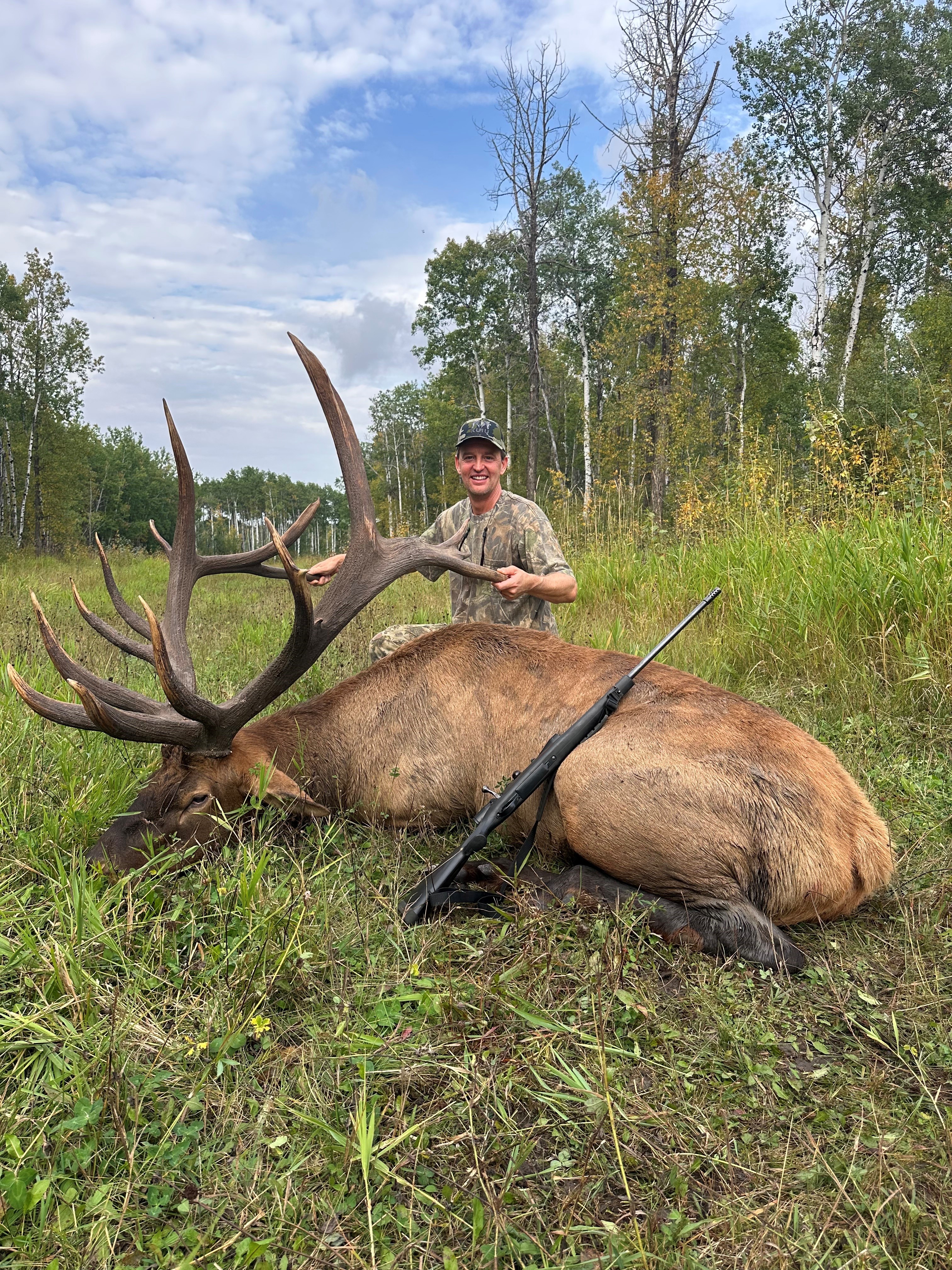 Erik Von Hellens with trophy bull elk at Echo Lake Hunts