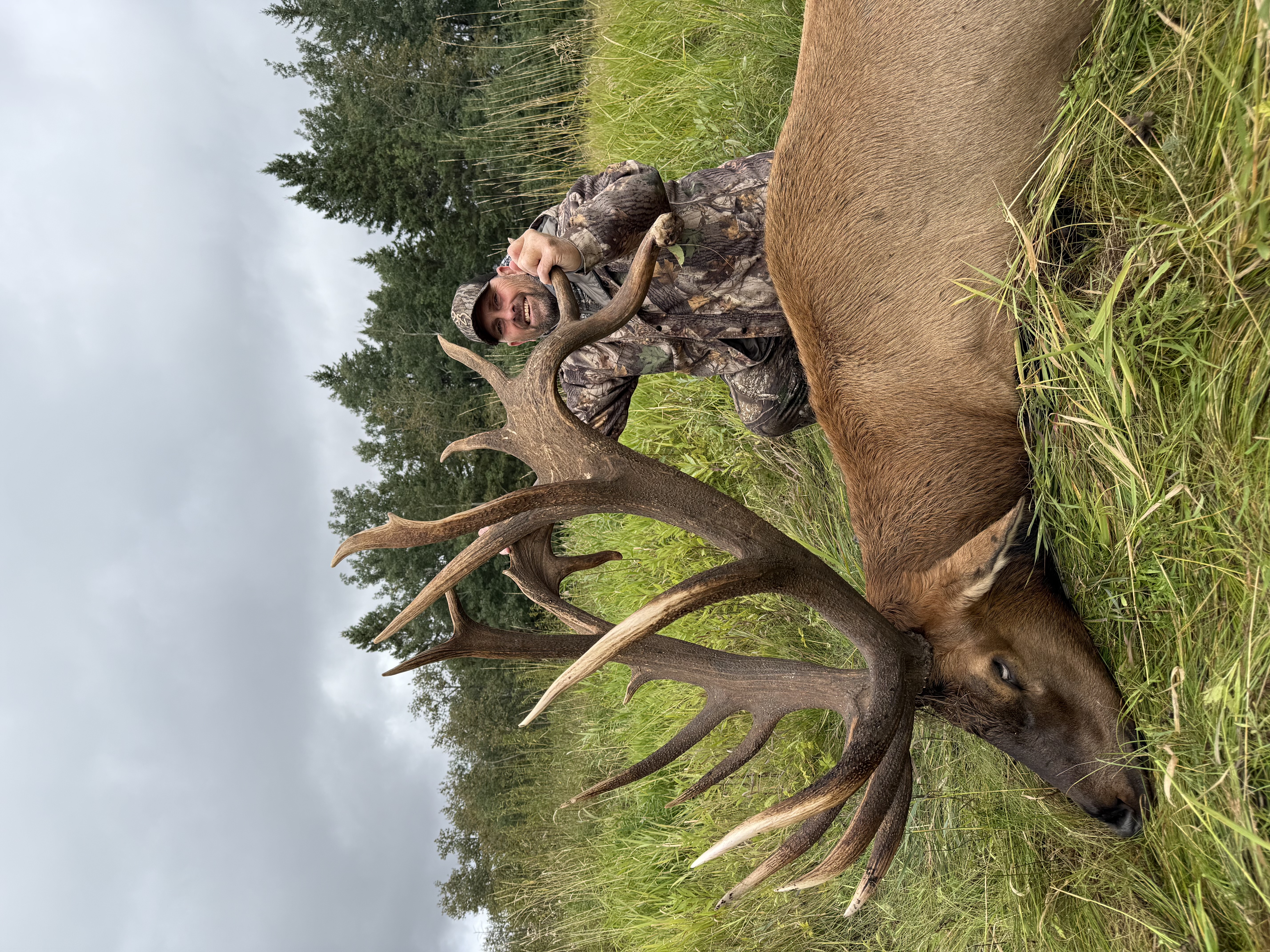 Bobby Jurisan from Michigan with a trophy bull elk at Echo Lake Hunts in Saskatchewan
