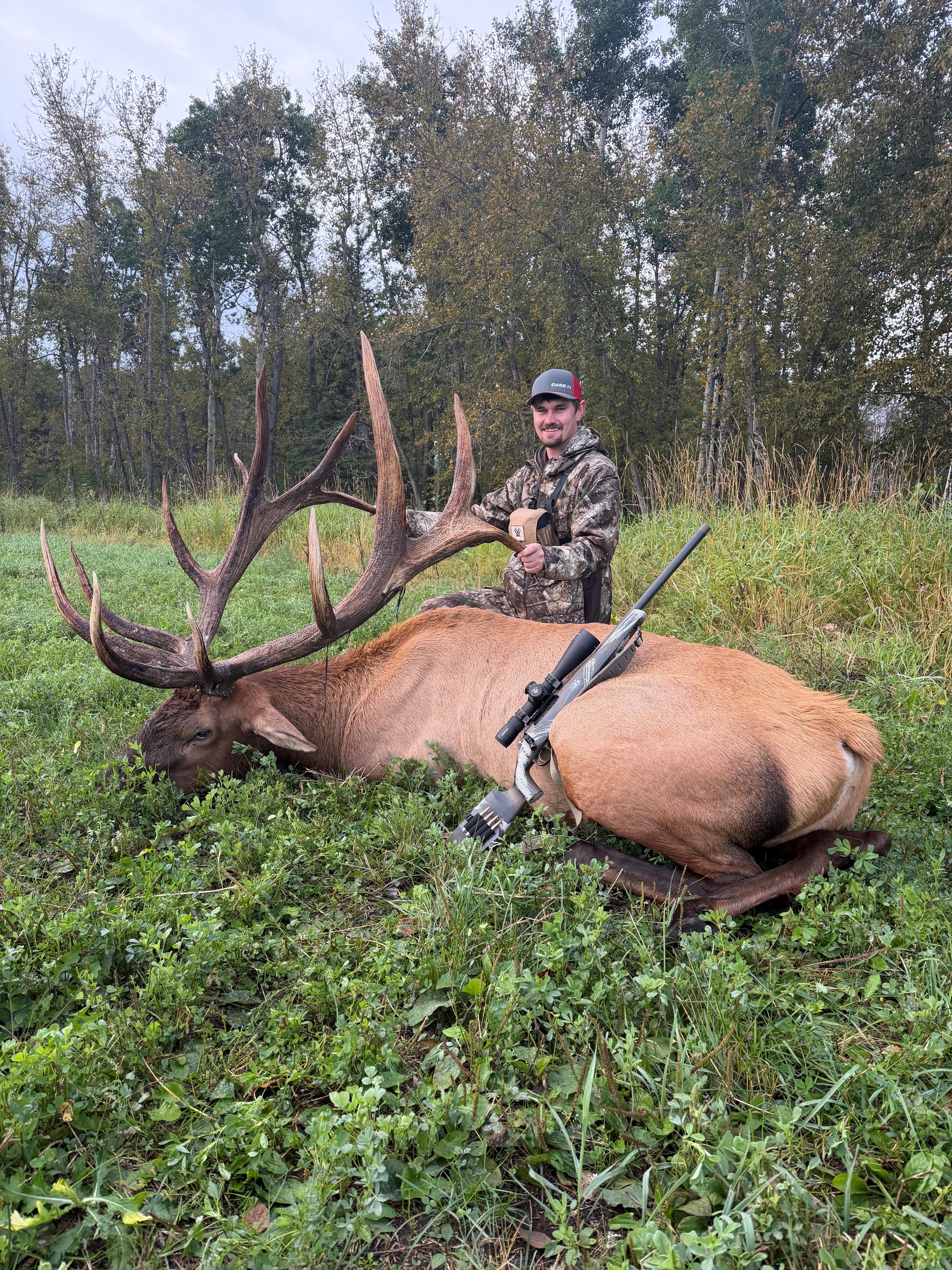 Dalton Oakland from Montana with a trophy bull elk at Echo Lake Hunts in Saskatchewan
