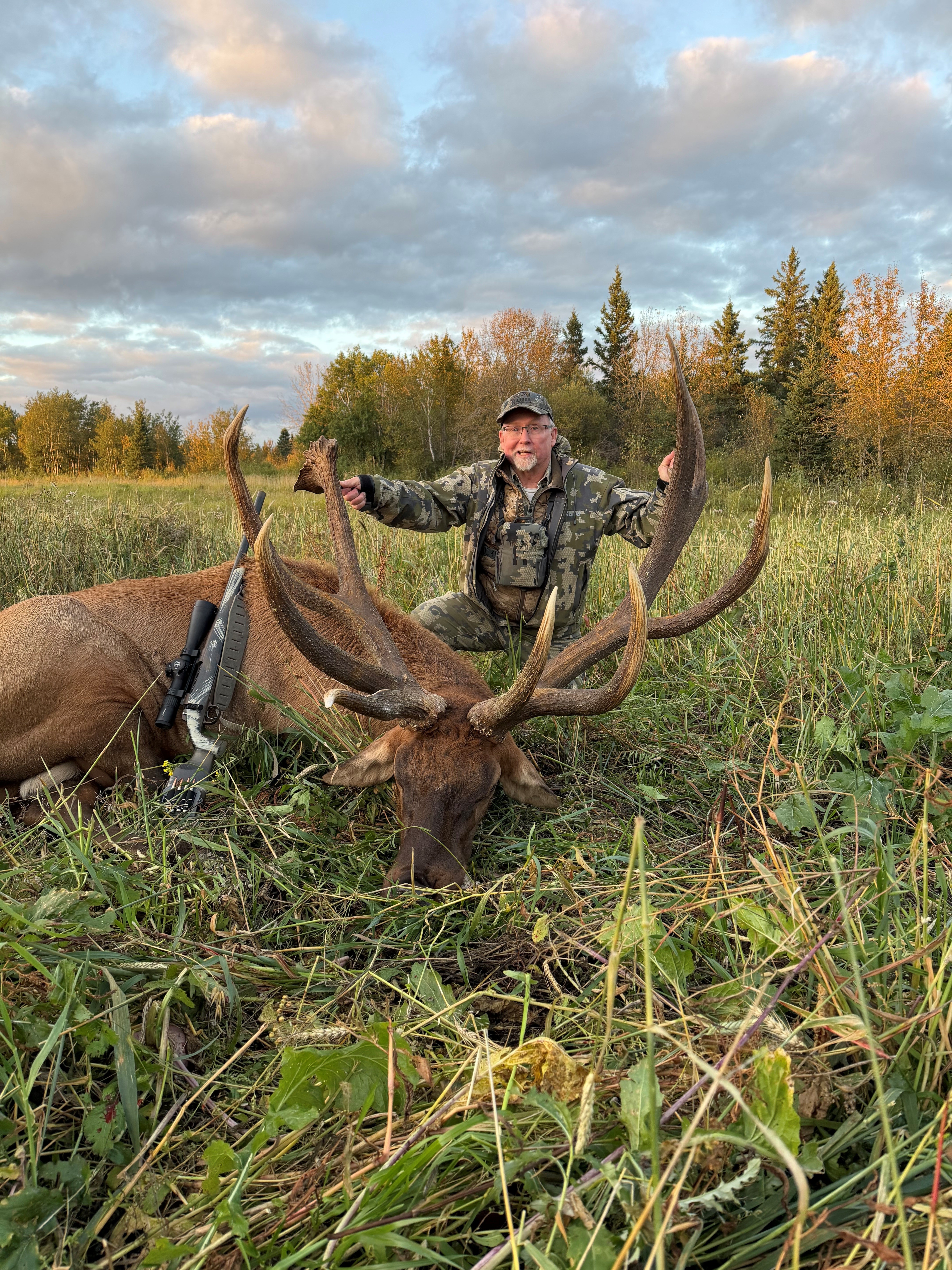 Jim McRoe from Montana with a trophy bull elk at Echo Lake Hunts in Saskatchewan