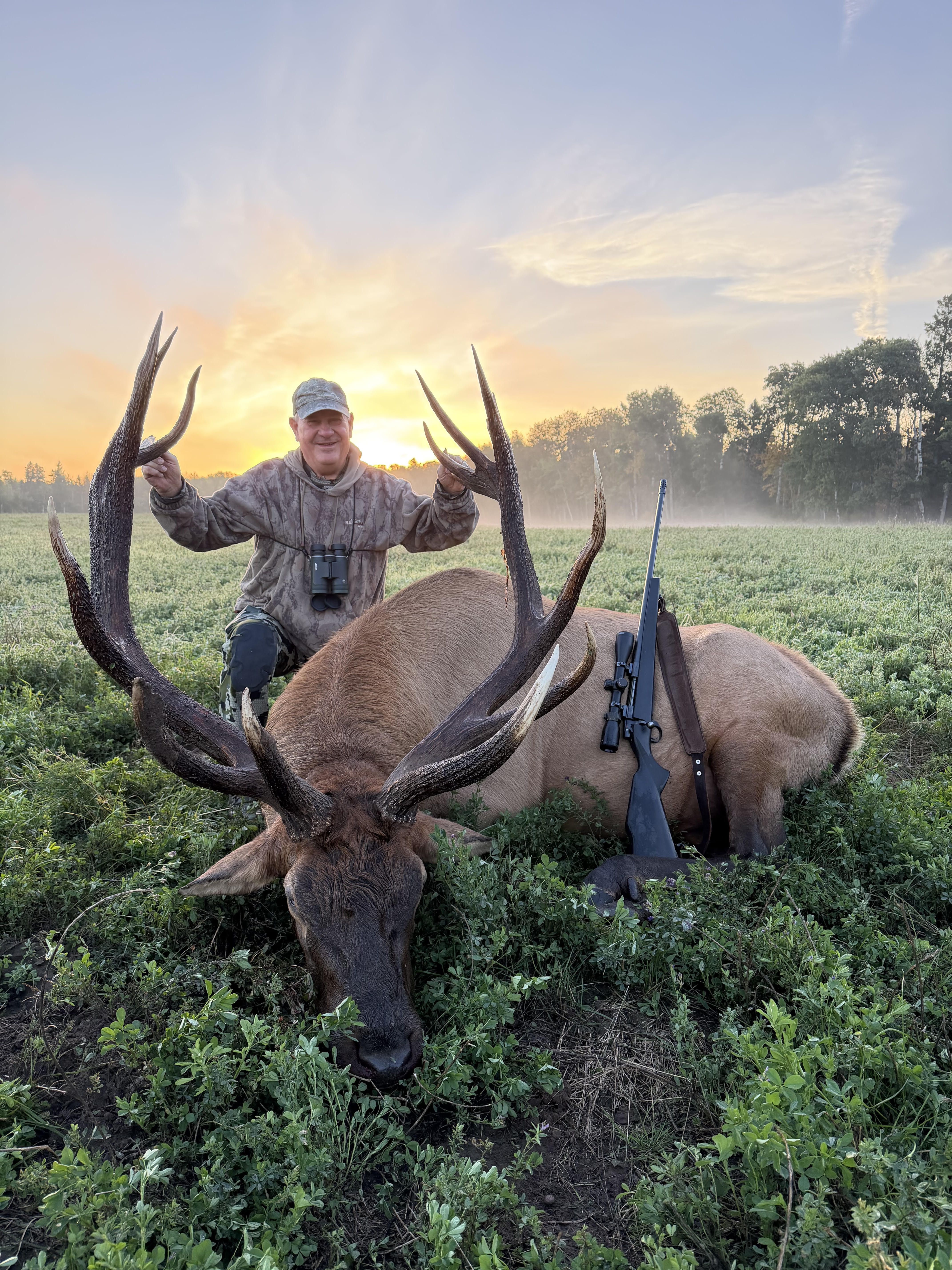 Joey Trice from Georgia with a trophy bull elk at Echo Lake Hunts in Saskatchewan