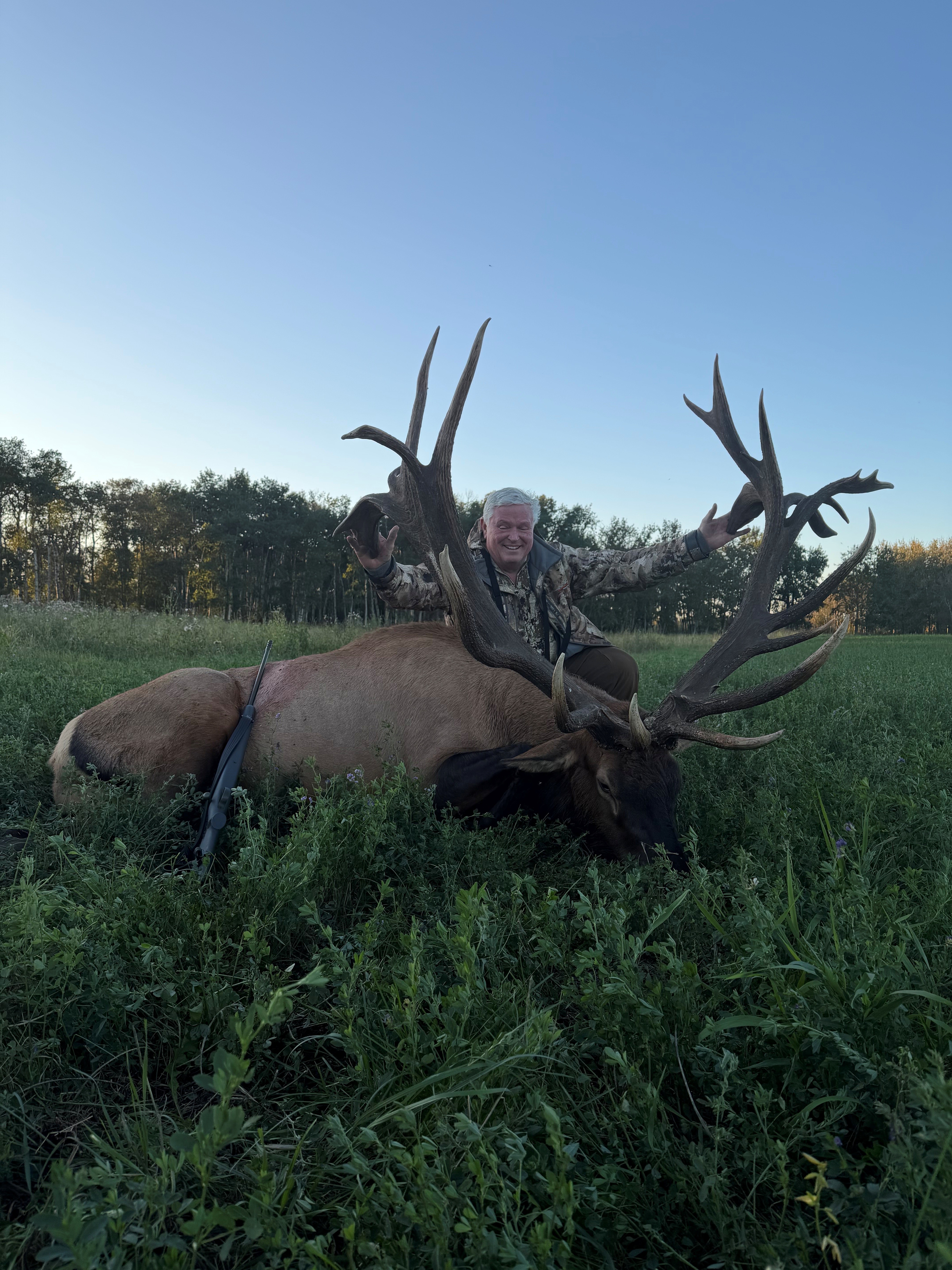 Pete Zeliff from Montana with a trophy bull elk at Echo Lake Hunts in Saskatchewan