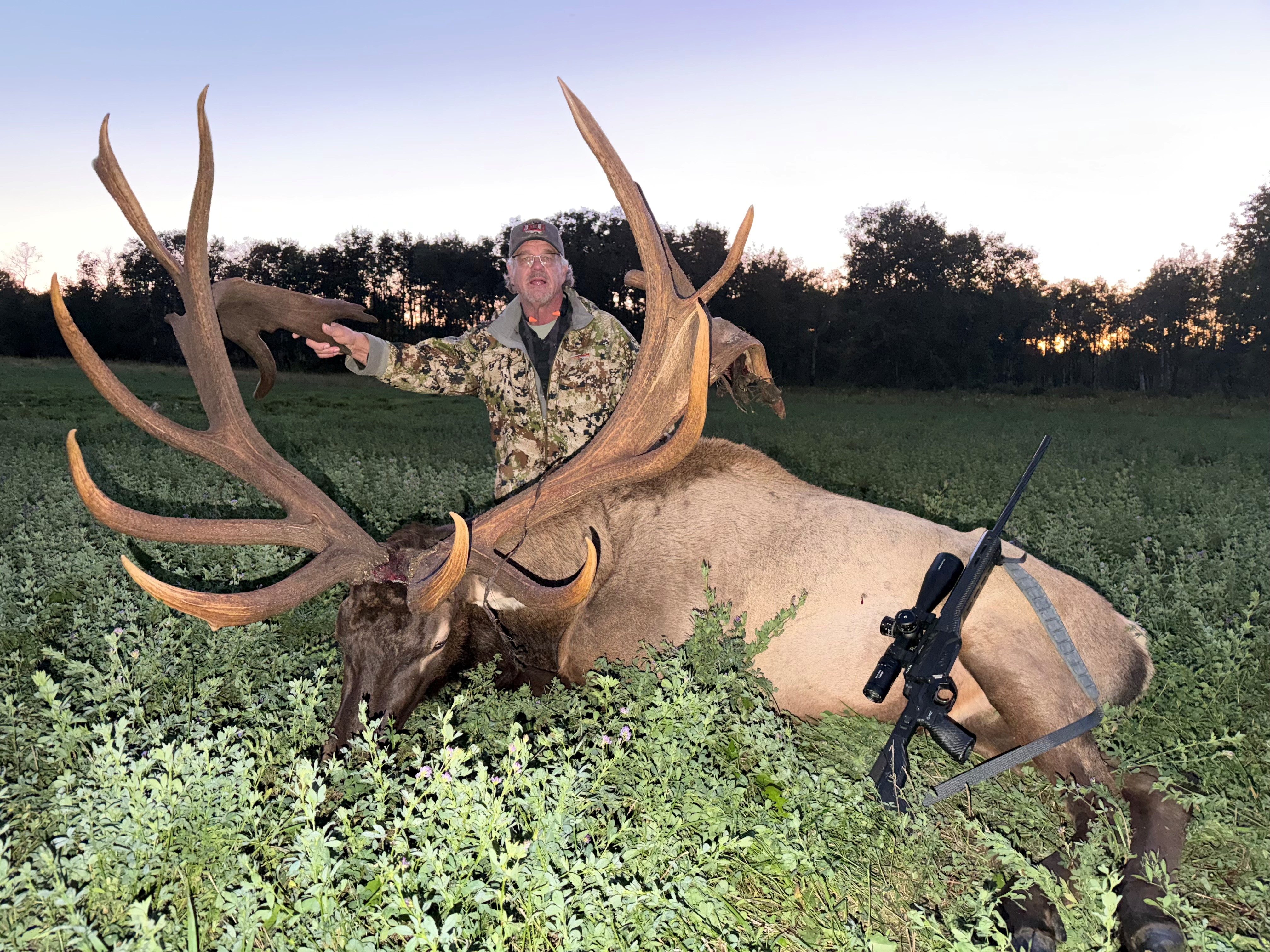 Ross Oakland from Montana with a trophy bull elk at Echo Lake Hunts in Saskatchewan