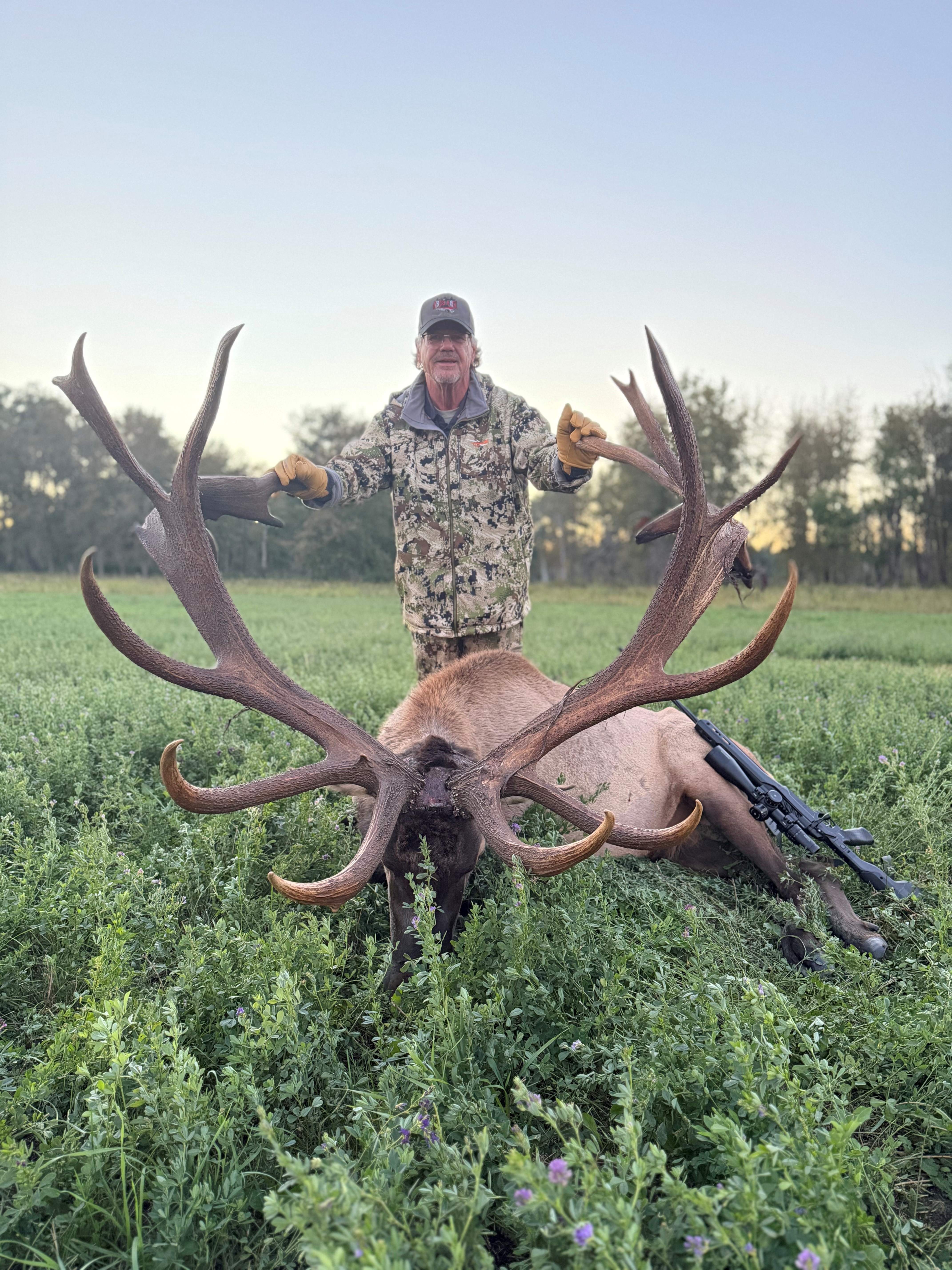 Ross Oakland from Montana with a trophy bull elk at Echo Lake Hunts in Saskatchewan