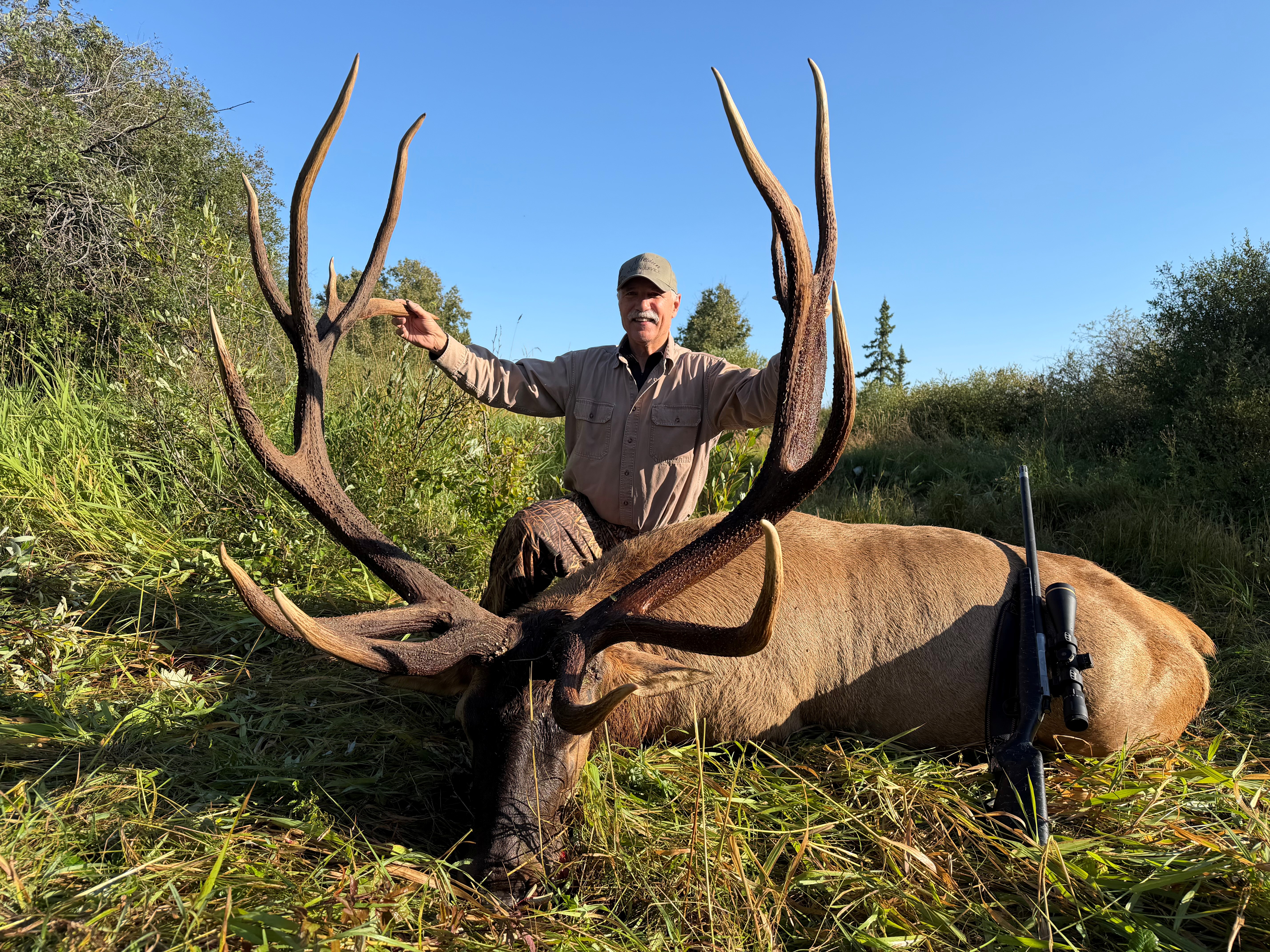 Tim Ostermeier from South Dakota with a trophy elk at Echo Lake Hunts in Saskatchewan